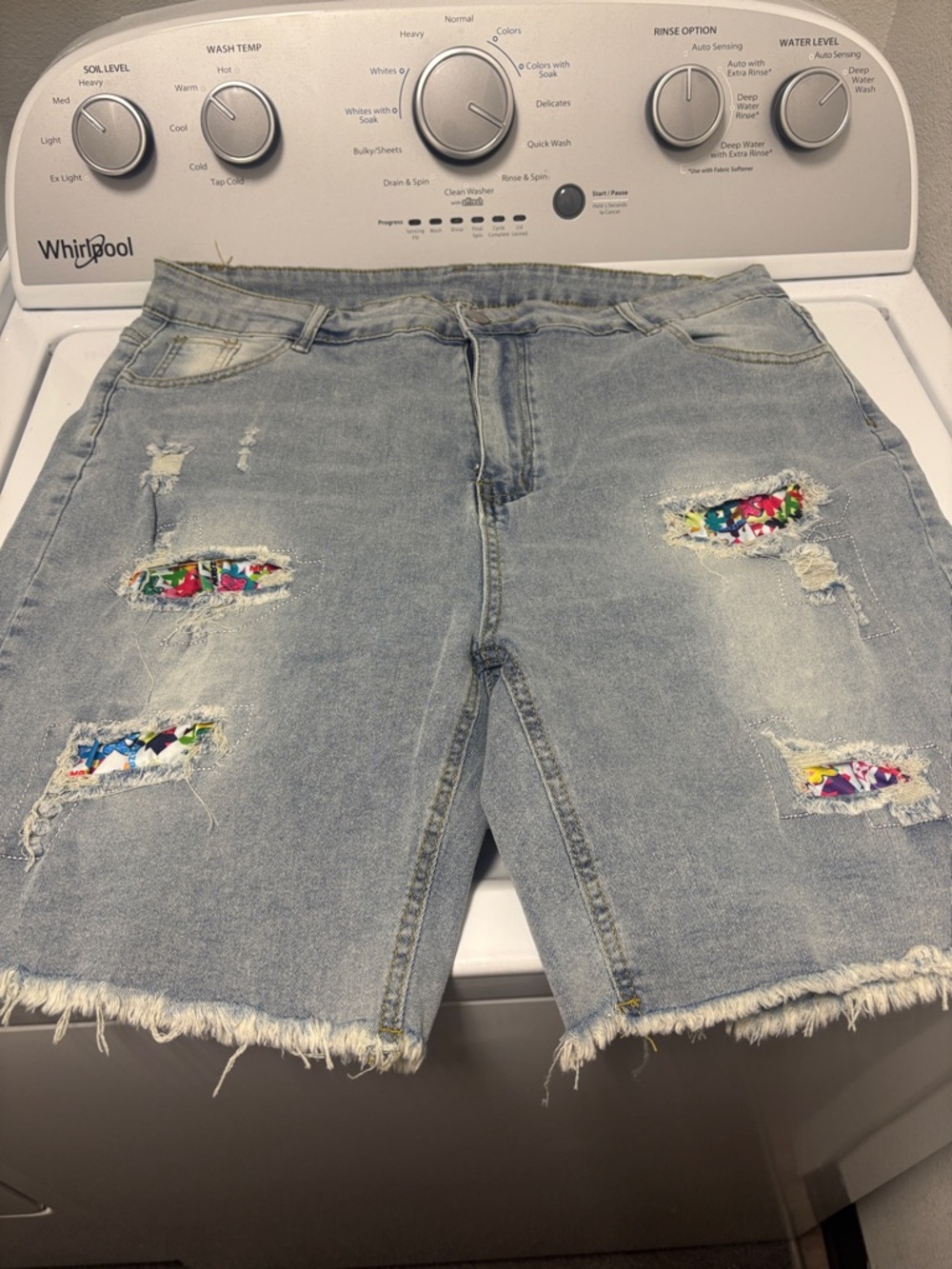 NWOT Fashion Nova Light Blue Distressed Jean Shorts with Multicolor Patch Detail